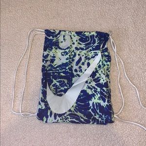 Nike blue and green tie dye draw string bag.